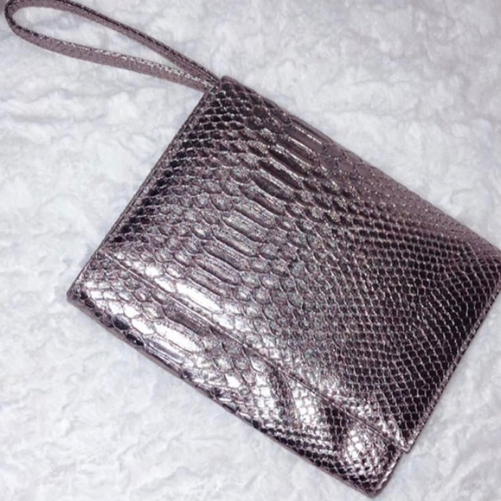 Neiman Marcus metallic grey wristlet